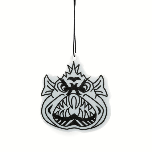 A hanging air freshener with the Ugly Fish logo resembling a anglerfish.