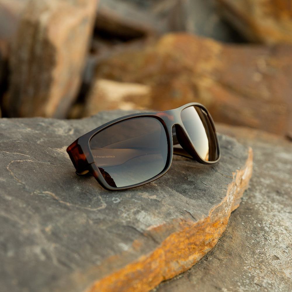 Ugly Fish polarised Sunglasses on a rock with a natural background